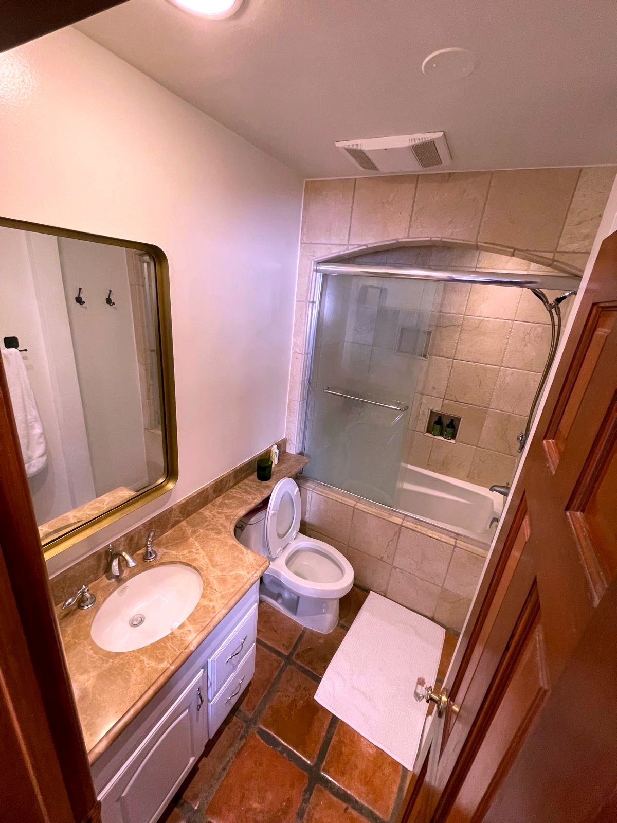 Outdated tub and shower combo before remodel — Santa Monica
