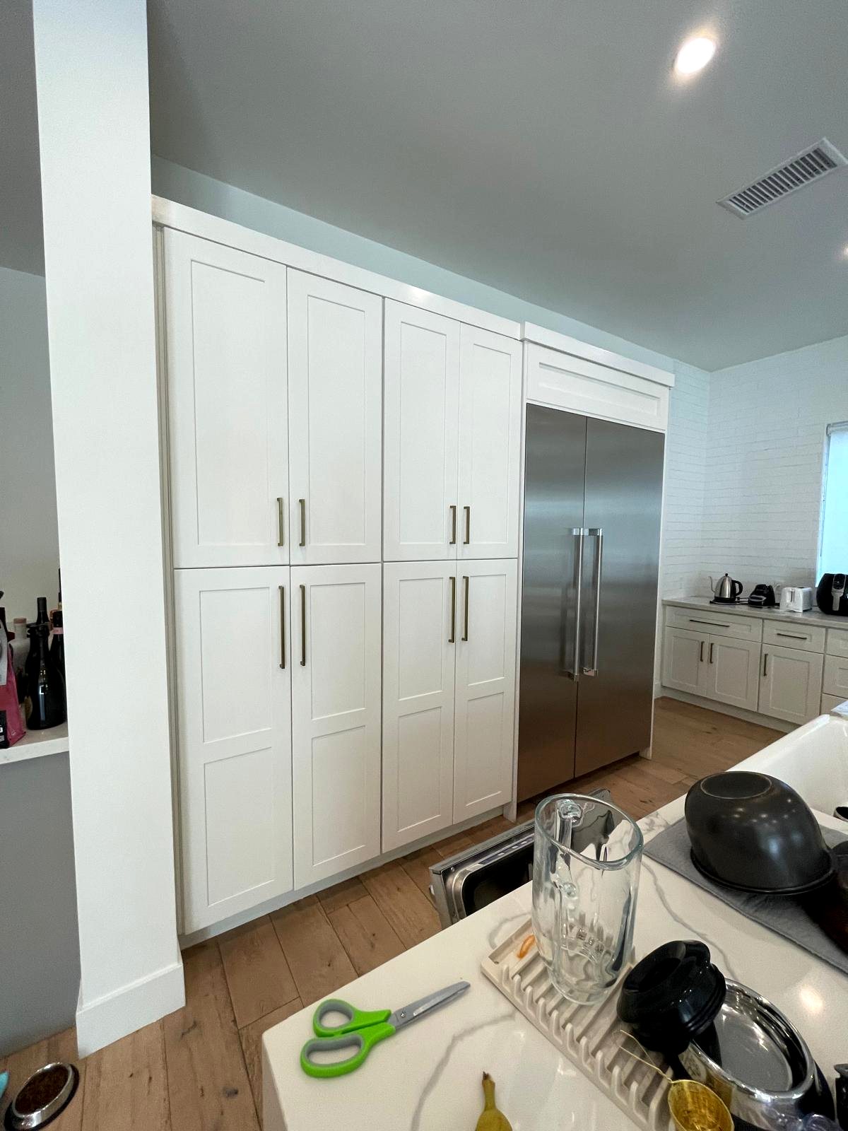 Kitchen remodel pantry wall with custom cabinetry — Los Angeles